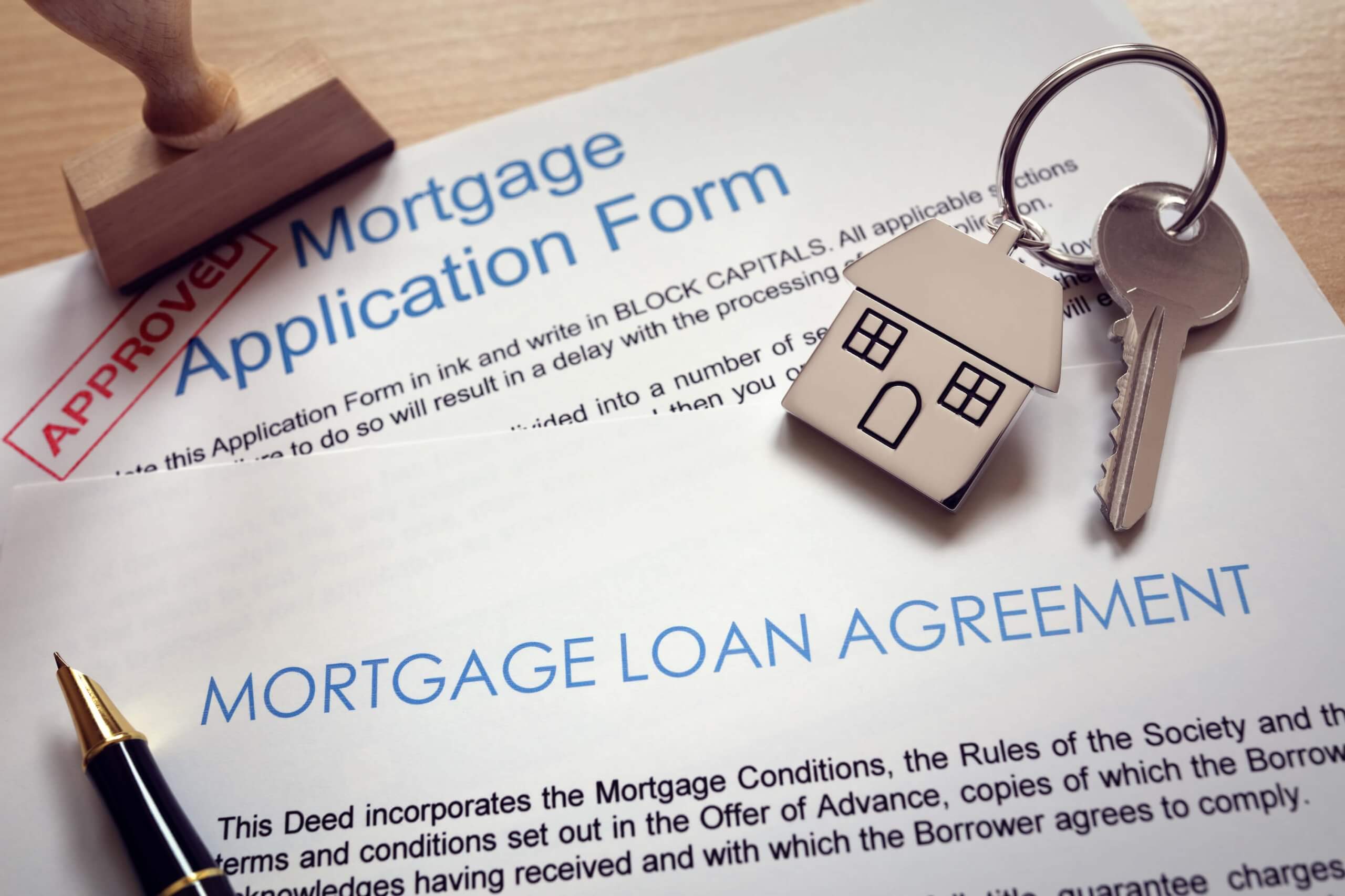 The Top 10 Mistakes To Avoid When Buying A Home In Toronto 3 Mortgage Application Loan Agreement And House Key 2022 02 02 05 05 24 Utc 1 Scaled