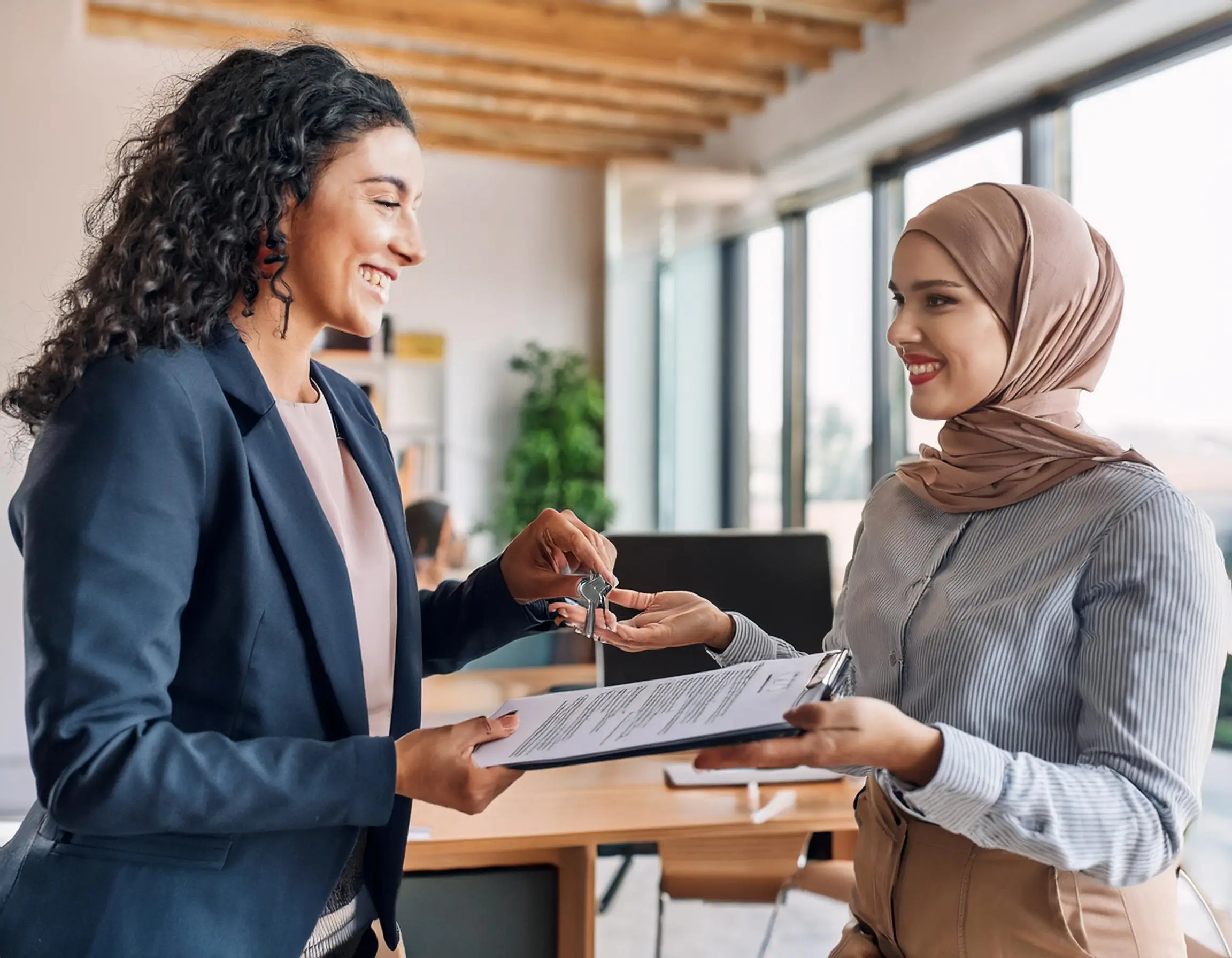 Are Property Taxes Included In Closing Costs 4 Are Property Taxes Included In Closing Costs 3 Firefly A Homebuyer And A Seller Exchanging Property Documents In A Modern Real Estate Office With